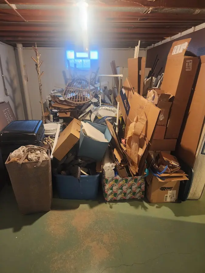 Roll-off dumpster container at job site for 8 Yard Dumpster Rental in Spotswood